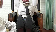 Strong older dude with glasses tied up to a chair and tickled