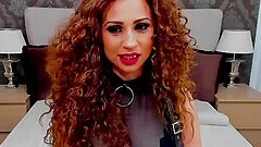 Curly big dick TS jerks off her big dick in private webcam show in bed