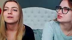 Two brunette amateur teen lesbian hotties stripping and tying in bed