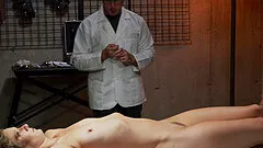 Skinny model tied up to a table and gets her puss and ass poked