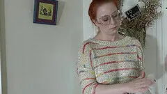 Chubby redhead slut pokes her pussy with a sex toy and moans