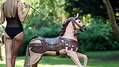 Solo blonde Nancy A poses naked and rides a long red dildo