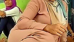 Beautiful Indonesian mom in hijab