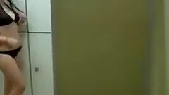 Hot couple fucks a young girl in the locker room in the pool