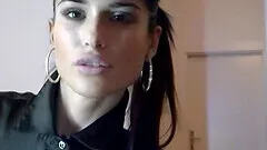 Solo brunette model pleasures her cunt with a vibrator and a dildo