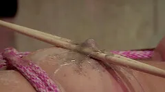 Tied up and tortured Violet Sky loves to play with a dildo