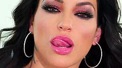 Busty brunette pornstar Kissa Sins eats cum after a rough mouth fuck