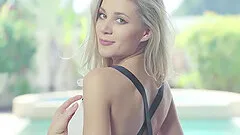 Amateur blonde model Candy loves to strip in front of the camera