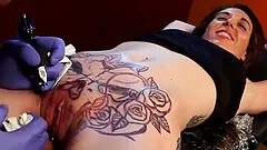 Marie Bossette gets an extreme  tattoo.
