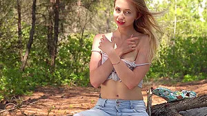 Skinny hottie Dominica enjoys rubbing her wet pussy outdoors