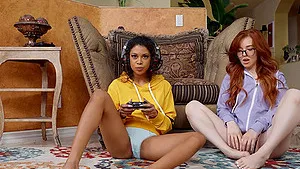 Fit gamer girls Jeni Angel and Madi Collins get fucked from behind