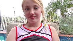 POV video of blonde cheerleader Dixie Lynn sucking a large dick