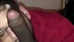 Gobbler sucks a big black cock like a pro