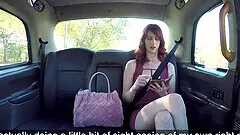 Sexy redhead enjoys amazing fuck in the car cabine with a stranger