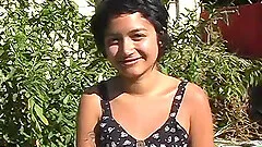 Young girl masturbates in the nature usig a vibrator and fingers