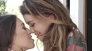 Two horny lesbian chicks love masturbating together on the couch