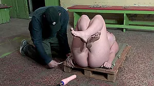 Chubby slave girl Lilith Lee enjoys getting penetrated with toys