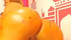 Wild transsexual pleasing her very large ass with a big toy