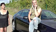 Hardcore outdoor blowjob from mature brunette MILF in a dress