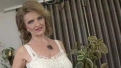 Mature amateur granny Raina W. cums while masturbating with toys