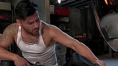 Greasy Latino gay car mechanic feeds his handsome customer with cum