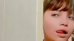 Gorgeous redhead babe strips down and unveils her round butt