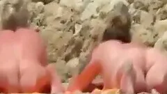 sister During our holiday my blonde wife and my busty friend surprised us by going naked on the beach.