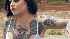 Brunette goth slut Ophelia Rain gets cum on face on the couch