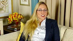 Busty blonde MILF fingers herself while wearing glasses