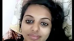 Indian teen beauty lifts up her shirt exposing those perky tits