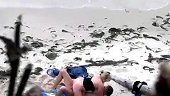 Young man fucking his young german wife doggystyle on the beach
