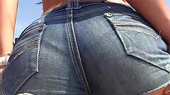 Brunette cutie picked up on the beach for a fuck and a facial