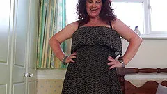 Amateur brunette mature granny Gilly strips at home