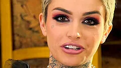 Tattooed short haired beauty Leigh Raven backstage interview