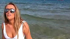 Blonde beach babe Harley Jade covered with cum after a pussy fuck