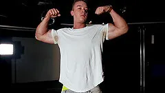 Fit blonde gay dude Jackson strips and jerks off in the club