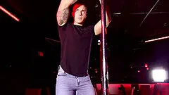 Male gay stripper pulls out his dong while pole dancing