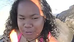 Cute island girl with big tits jerks off a big black cock