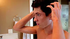 Teen gay guy sits on a dildo while masturbating at home