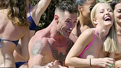 Blonde bikini babe Sicilia gets a cumshot at a beach party