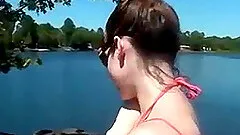Busty brunette teen gives an outdoor sloppy blowjob in public