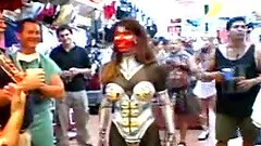 Fake tits cowgirl drinking passionately in public