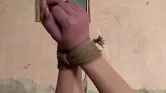 Tied up chick gets her tiny pussy stretched by a long toy