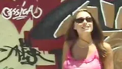 Brunette natural tits caressed in public porn scene