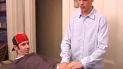 Matthew has him lie down on it and quickly strips his clothes off