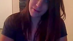 Pregnant brunette strokes her big belly and tits