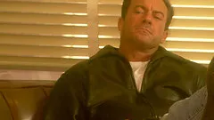 Syvette pleasuring a good-looking fella with a tattoo at a bar