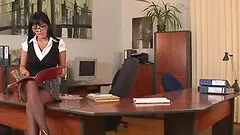 Lingerie clad lesbian couple fucking with a strap on dildo