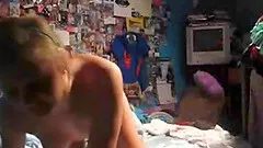 Hot blonde using a finger vibrator on the bed for you