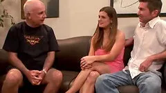 Babe takes off her pink dress during a nasty cuckold game